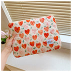 Pochette ordinateur femme matelassée, imprimé cœurs ou fleurs