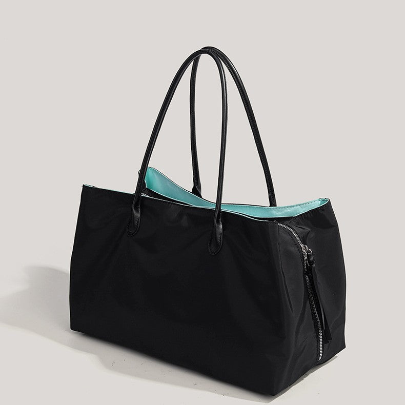 Sac ordinateur femme cabas noir, doublure turquoise contrastée