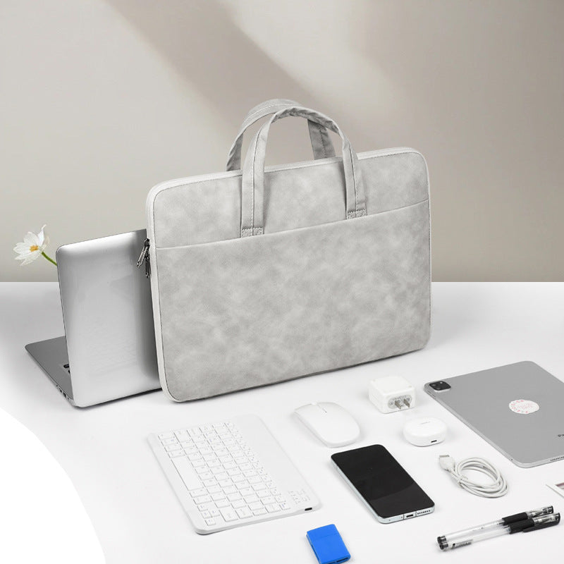 Pochette ordinateur en simili cuir mat, ouverture à plat sur 180°