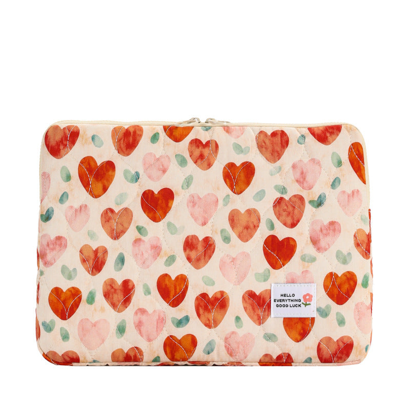 Pochette ordinateur femme matelassée, imprimé cœurs ou fleurs