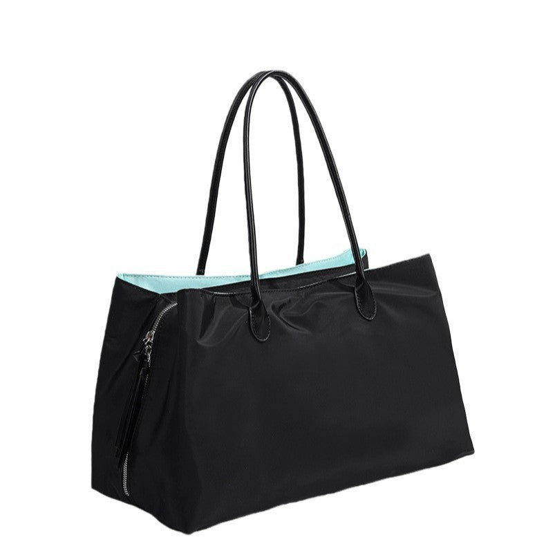 Sac ordinateur femme cabas noir, doublure turquoise contrastée