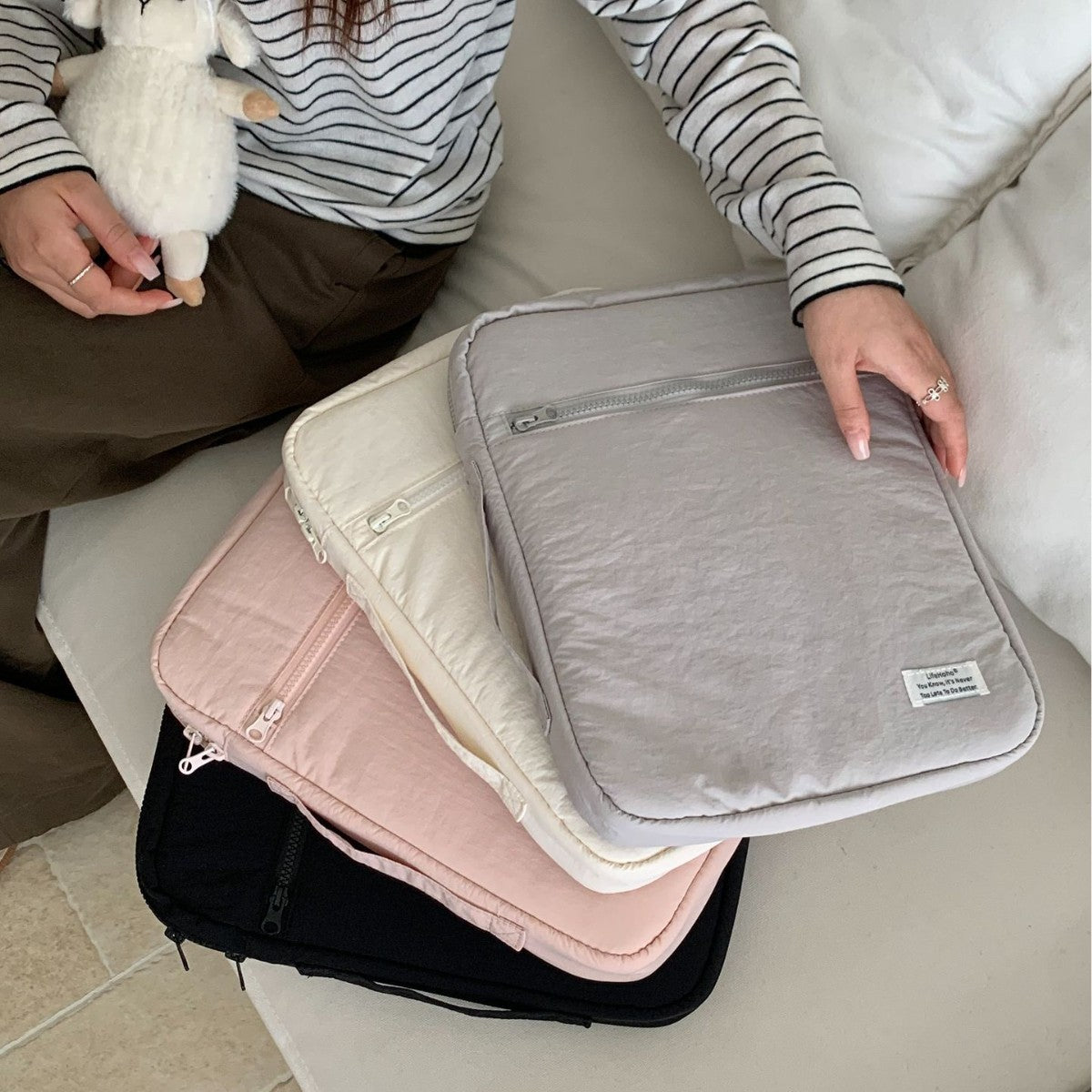 Pochette ordinateur matelassée à poche zippée, 11 à 14 pouces