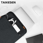 Pochette ordinateur matelassée à poignée et poche avant zippée