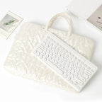 Pochette ordinateur matelassée à poignées, effet doudoune brillant