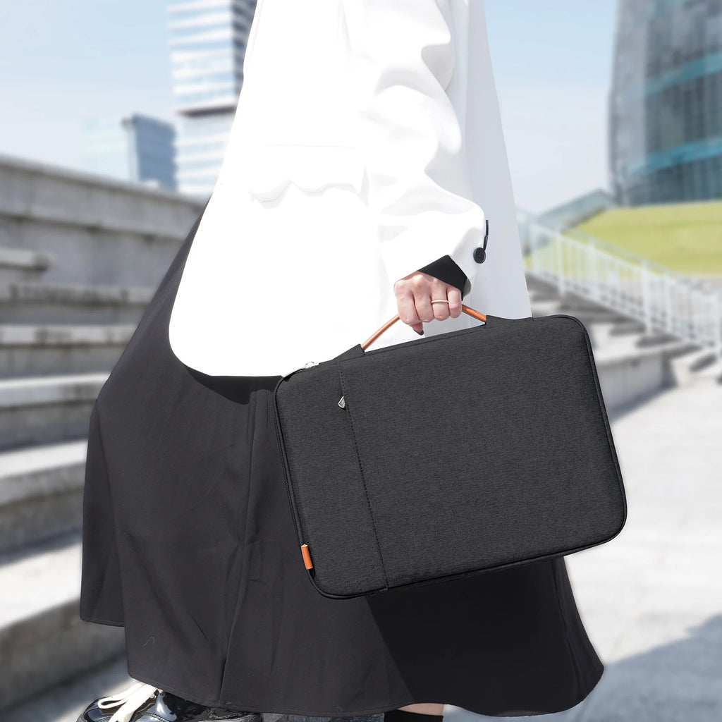 Pochette ordinateur matelassée à poignée et poche avant zippée
