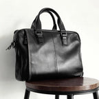 Sacoche ordinateur cuir homme noir grainé, poignées et bandoulière