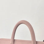 Pochette ordinateur femme rose à poignées, simili cuir perforé