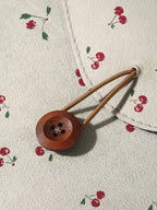 Housse ordinateur 13 pouces à rabat, imprimé cerises, bouton bois