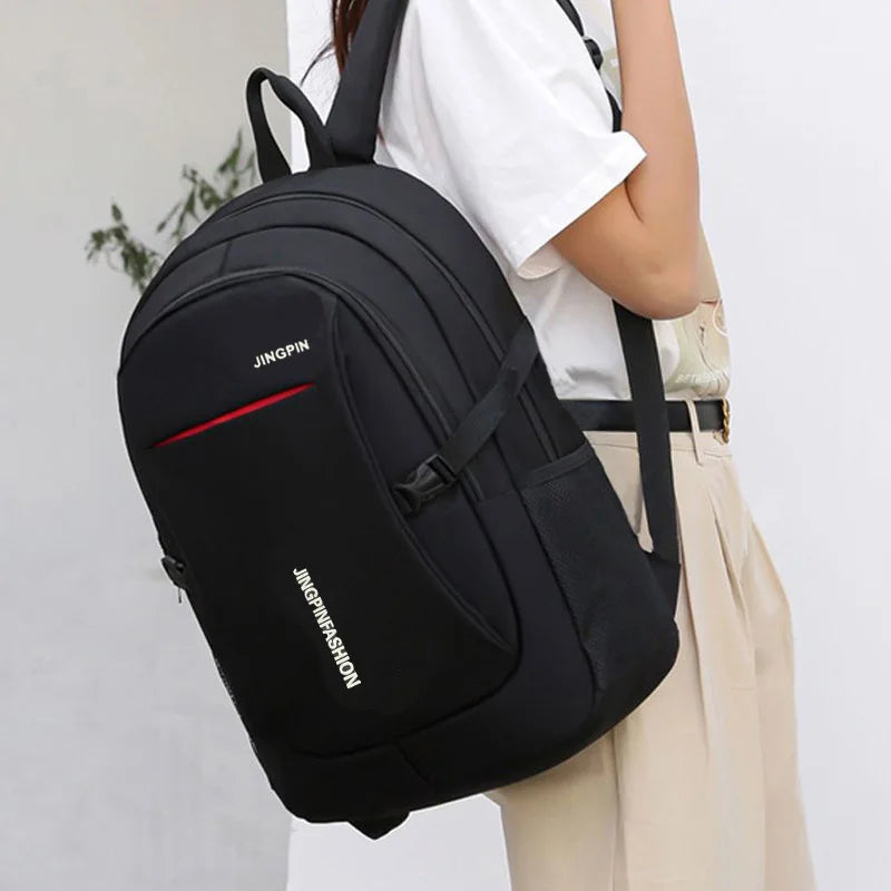 Sac à dos ordinateur en nylon noir à liseré rouge, poches gourde