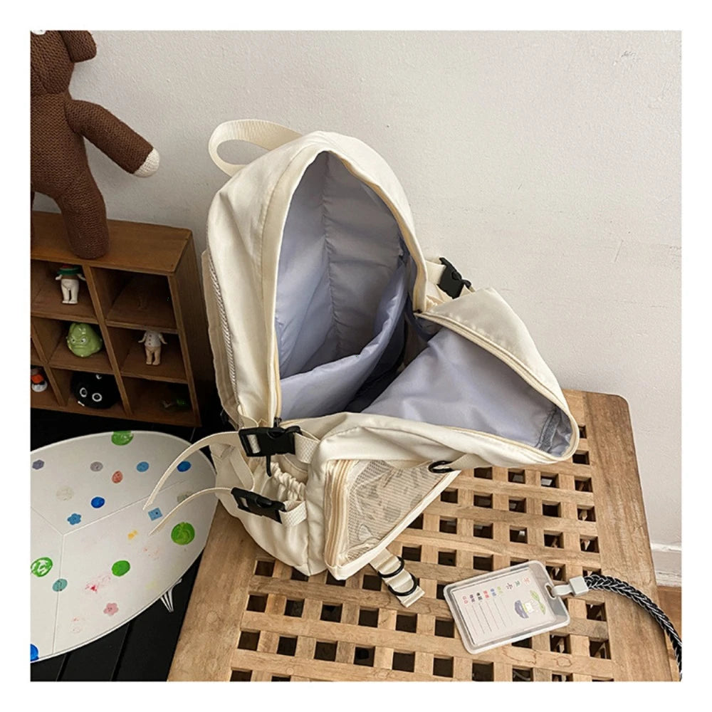 Sac à dos ordinateur femme à poche transparente et pochette cœur