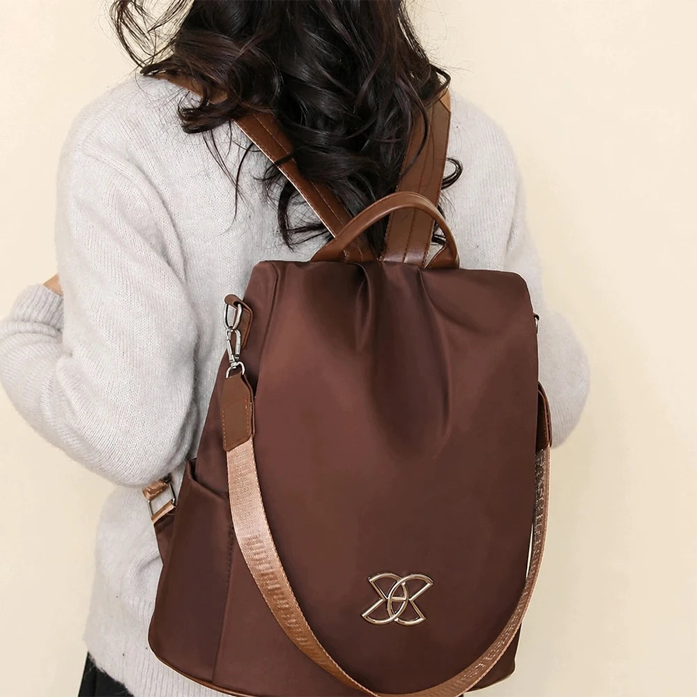 Sac à dos ordinateur femme antivol en oxford marron, convertible