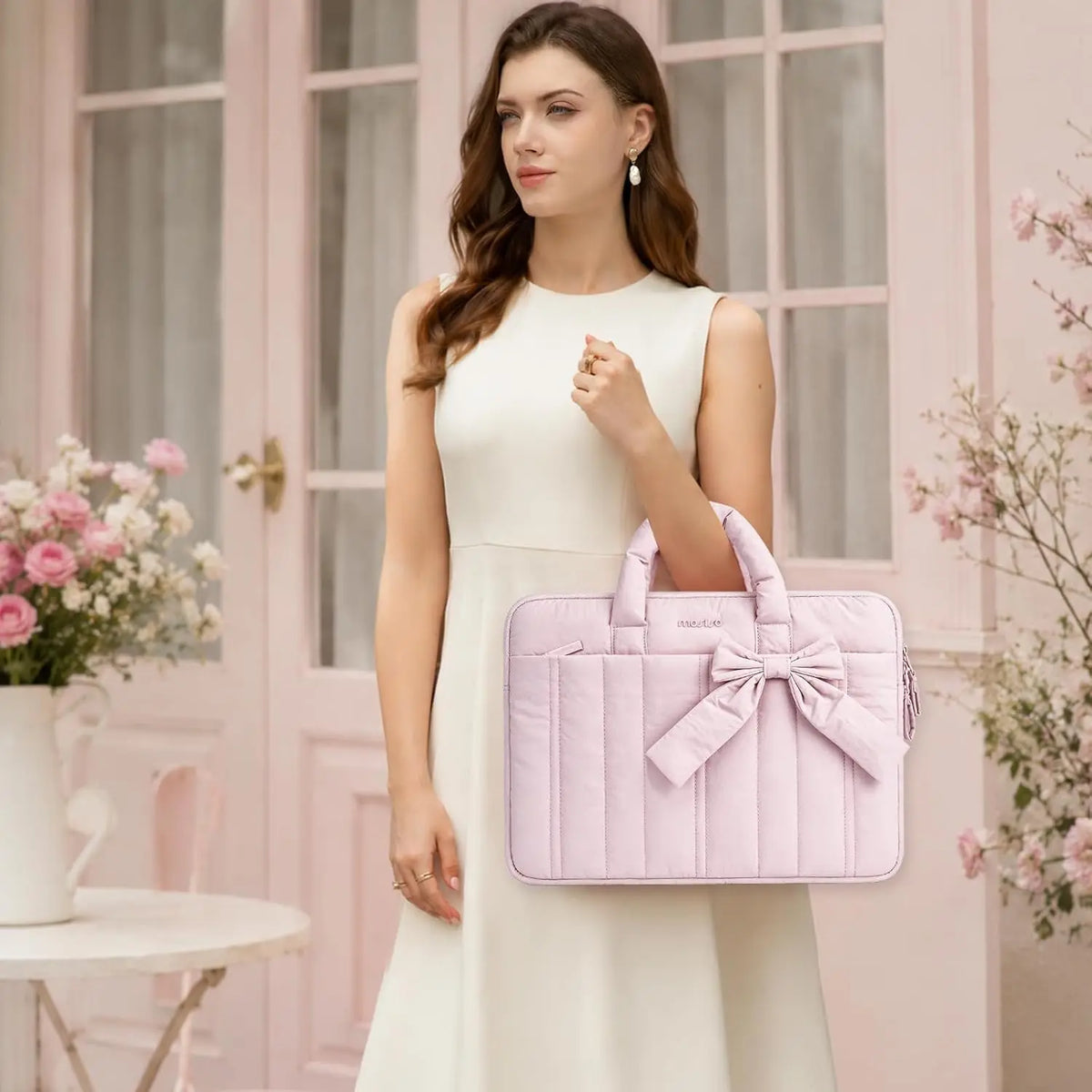 Pochette ordinateur femme matelassée à nœud, poignées et poche