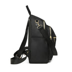 Sac à dos ordinateur compact en nylon matelassé, finitions dorées