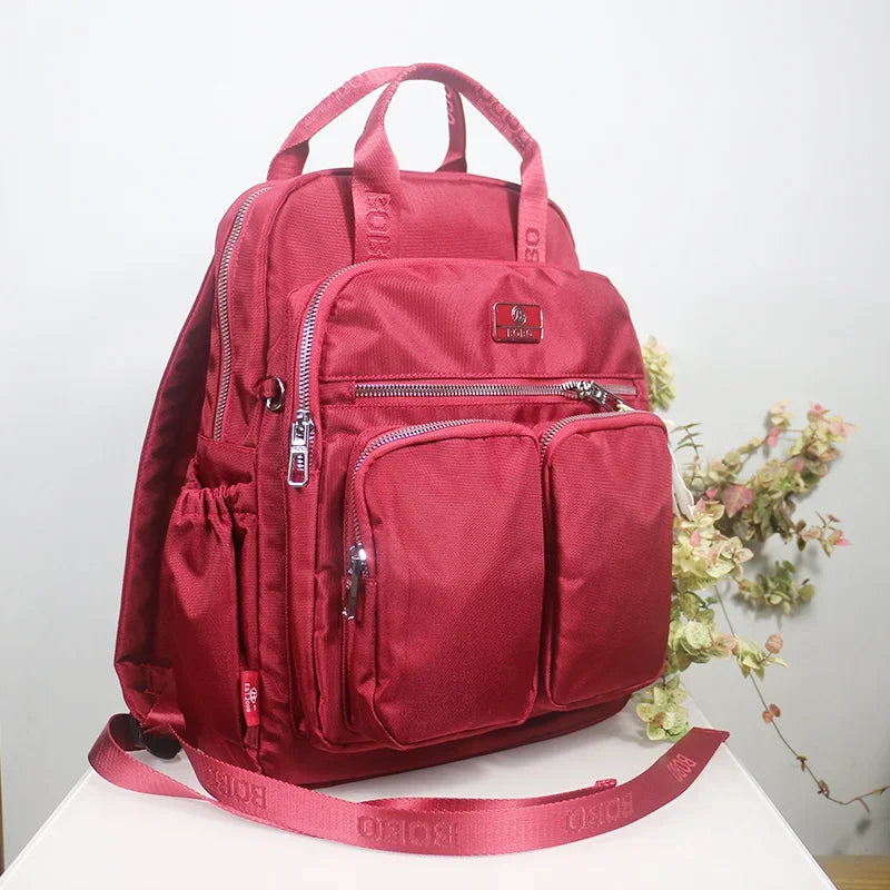 Sac à dos compact en nylon, porté trois façons