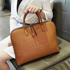 Sac ordinateur femme effet croco noir, à main et bandoulière